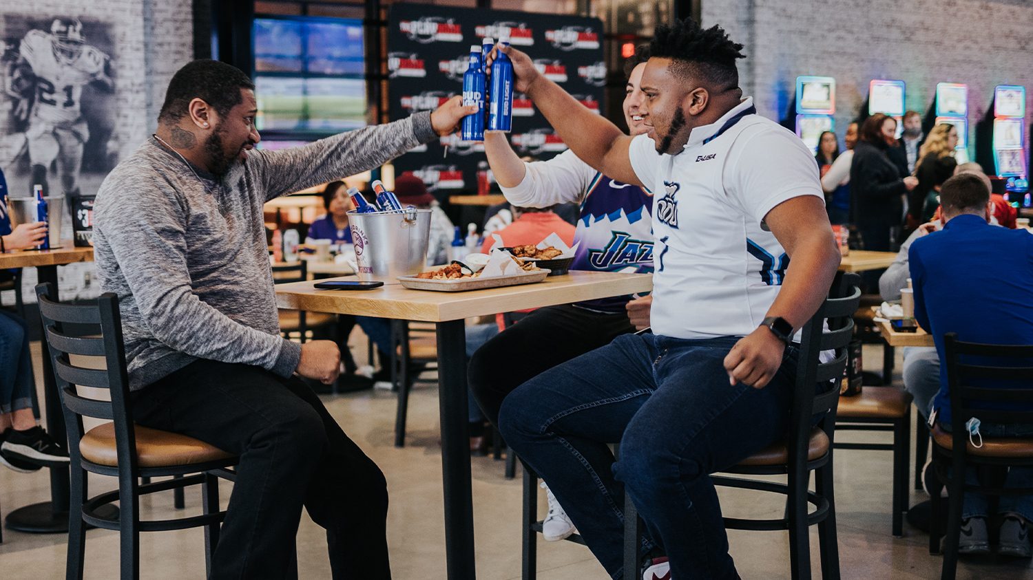 Friends Cheers at The Playbook Sports Bar + Grill at Rosie's in Richmond