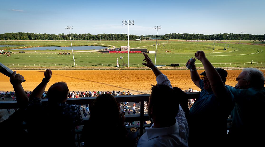 Fans watching Horse Racing at Colonial Downs in New Kent